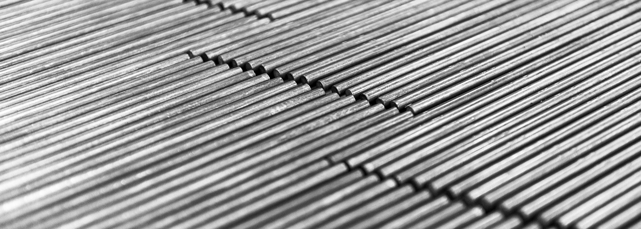 Close up image of rods of steel used in a display