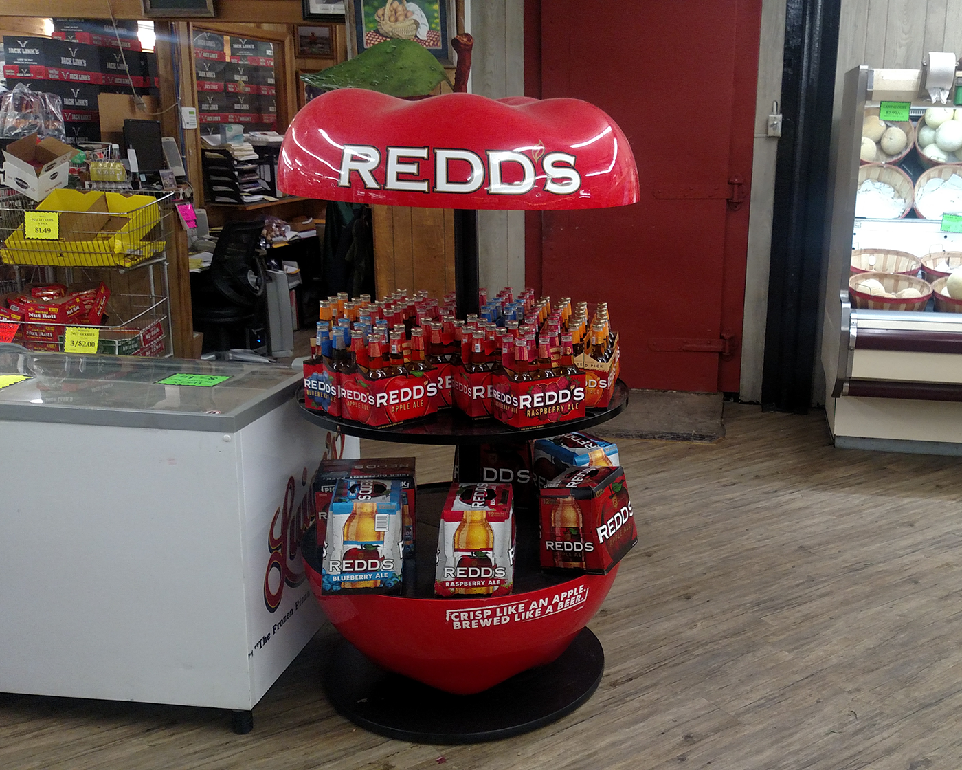 Redd's beverage retail display on a store floor